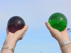 Purple and Green glass spheres